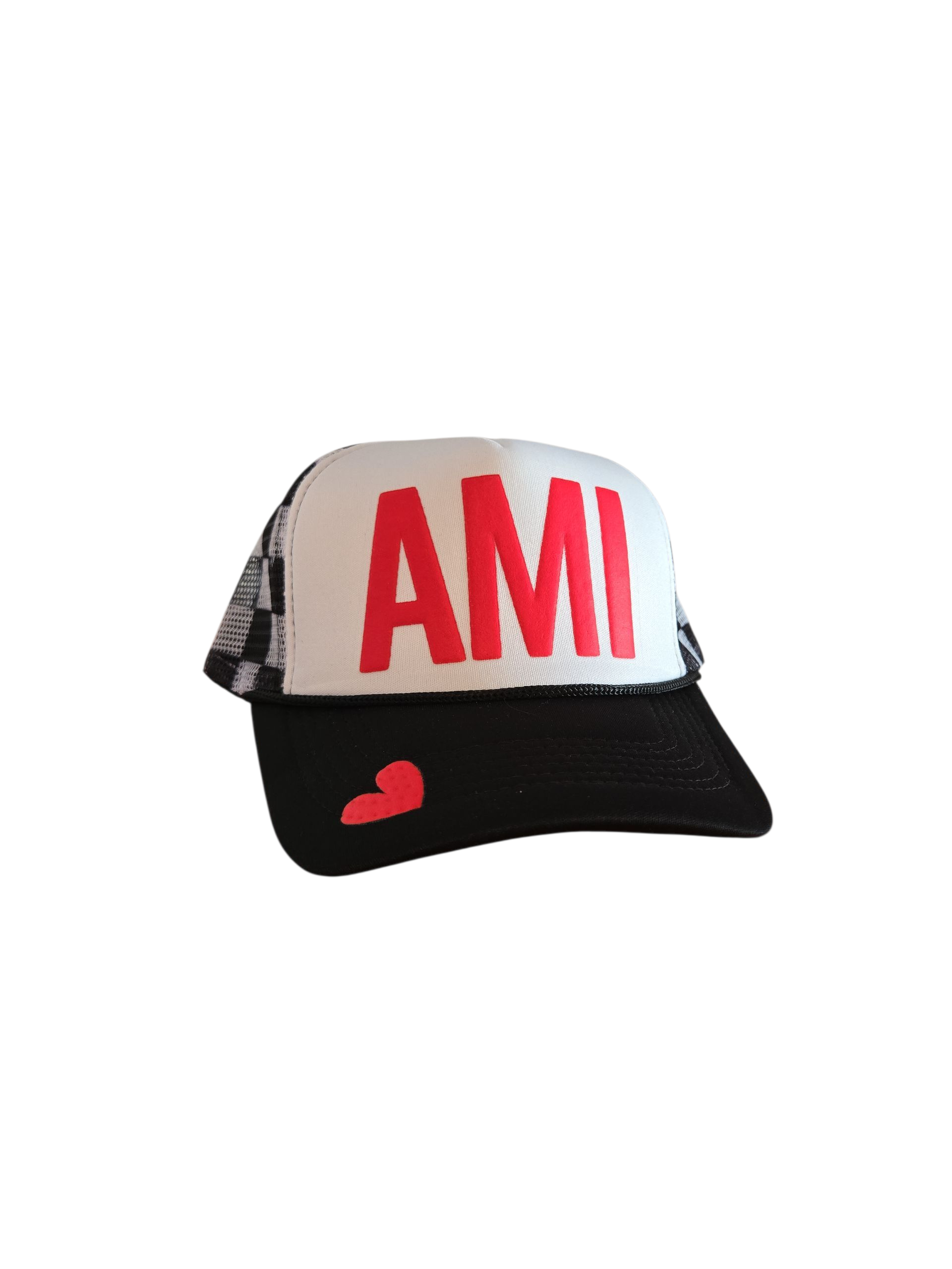 Black and white AMI trucker hat with red lettering and a red heart on the bill by Gnarly Mangrove Designs on Anna Maria Island.