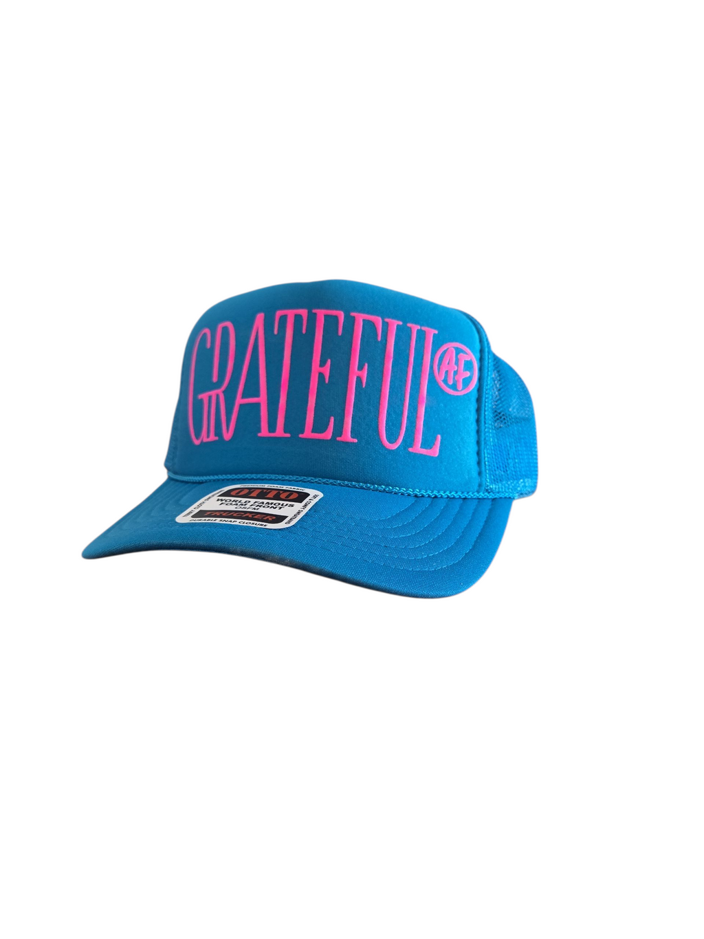 Blue Grateful a.f with pink letters on a trucker hat by gnarly mangrove designs in bradenton